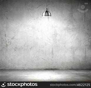 Stone blank wall. Stone blank wall illuminated with hanging above lamp. Place for text
