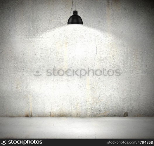 Stone blank wall. Stone blank wall illuminated with hanging above lamp. Place for text