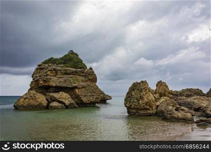 Stone blocks of volcanic origin on the coast of the island of Zakynthos (Greece)
