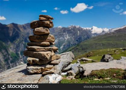 Stone cairn in Himalayas. Near Manali, above Kullu Valley, Himachal Pradesh, India. Stone cairn in Himalayas