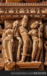 Stone carving bas relief sculptures on Vaman Temple, famous indian tourist site Khajuraho, Madhya Pradesh, India. Sculptures on Khajuraho temples