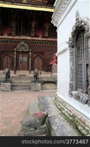 Stone cow and temple Changu Narayan near Bhaktapur, Nepal