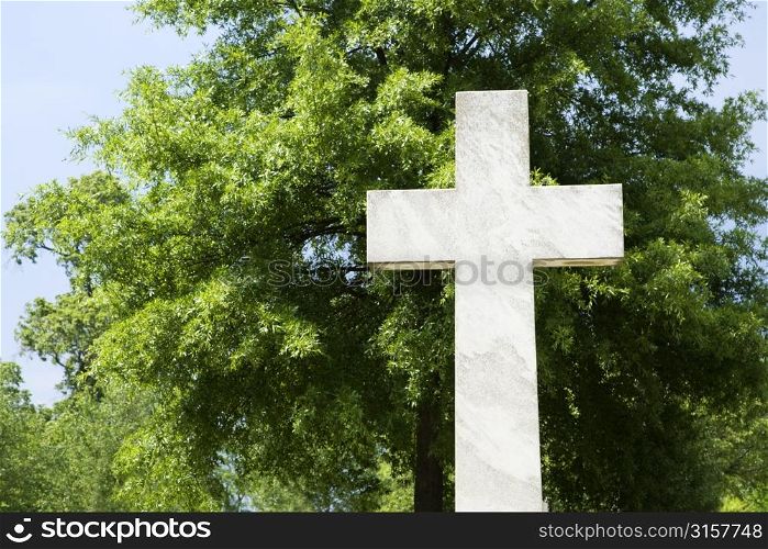 Stone cross, and trees