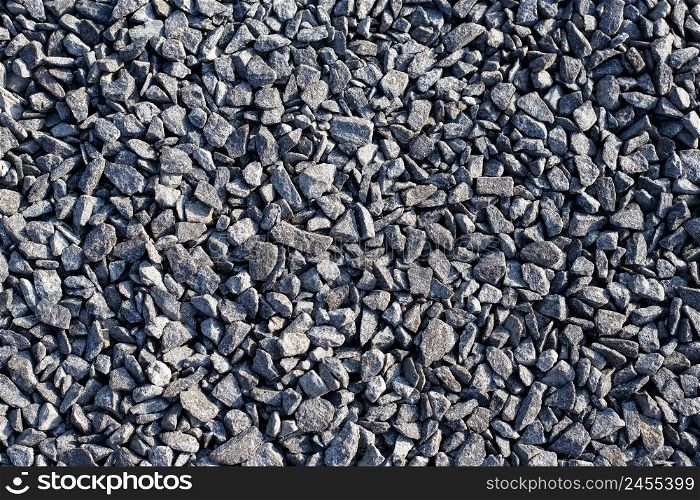 Stone, crushed stone texture background. Top view, close-up. Stone sea beach close-up. High quality photo. Stone, crushed stone texture background. Top view, close-up. Stone sea beach close-up. High quality photo.