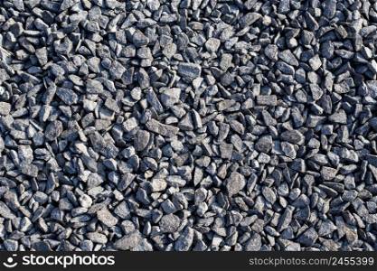 Stone, crushed stone texture background. Top view, close-up. Stone sea beach close-up. High quality photo. Stone, crushed stone texture background. Top view, close-up. Stone sea beach close-up. High quality photo.