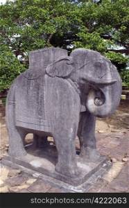 Stone elephant on the ground of royal tomb near Hue, Vietnam