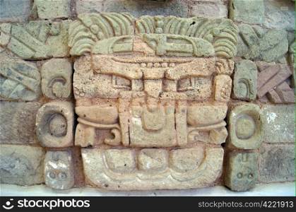 Stone face of mayan god in Copan muserum, Honduras