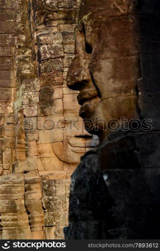 Stone Faces the Tempel Ruin of Angkor Thom in the Temple City of Angkor near the City of Siem Riep in the west of Cambodia.. ASIA CAMBODIA ANGKOR ANGKOR THOM
