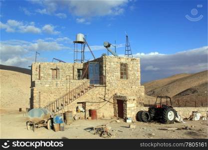 Stone farm house in desert area, Syria
