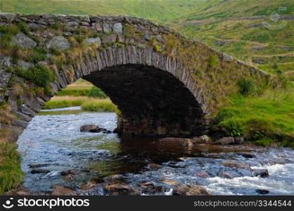 Stone footbridge in the Highlands