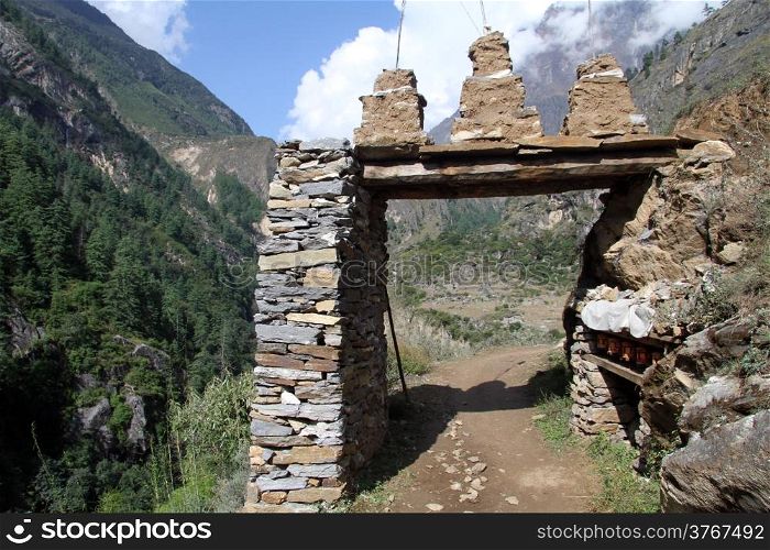 Stone gate at the entrance of village in Nepal