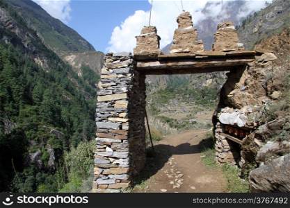 Stone gate at the entrance of village in Nepal