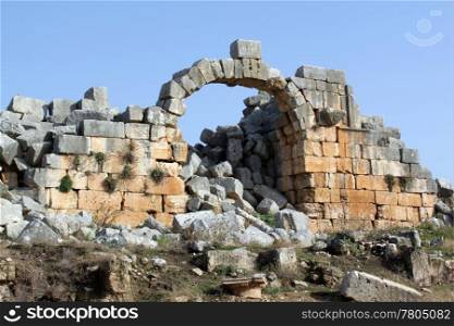 Stone gate in ancient city Apamea, Syria