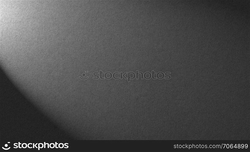 Stone gray background with light shadow texture for building repair decoration interiors. dark grey coal carbon color. Minimalism style. Stone gray background with light shadow texture for building
