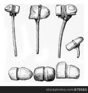 Stone hammers with grooves for the handle, vintage engraved illustration. From the Universe and Humanity, 1910.