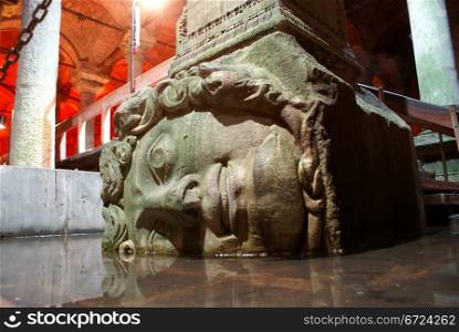 Stone head in uderground cistern in Istanbul, Turkey
