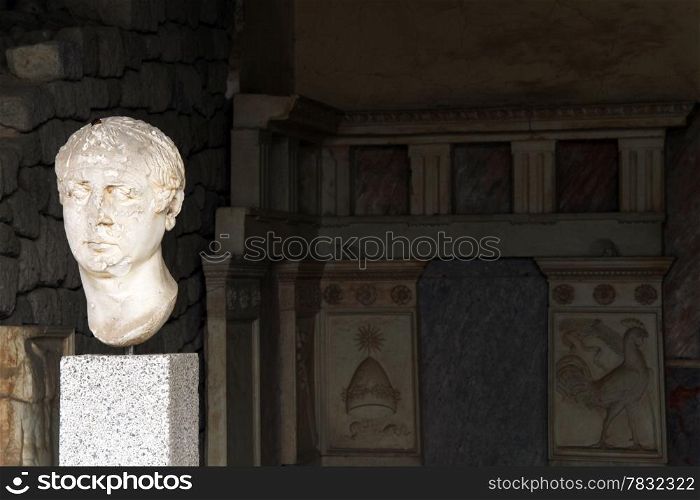 Stone head of ancient man and room of villa, Bergama