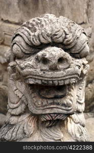 Stone head of lion in Inwa, Mandalay, Myanmar