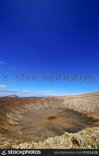 stone in los volcanes lanzarote spain volcanic timanfaya rock sky hill and summer