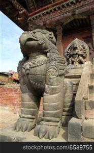 Stone lion and syaircase of temple in Bhaktapur, Nepal