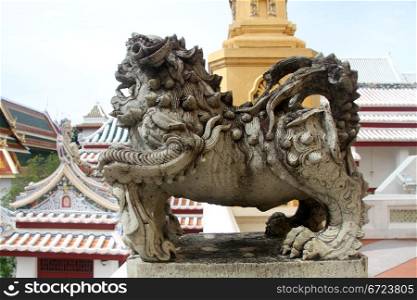 Stone lion statue in wat Bowonniwet in Bangkok, Thailand