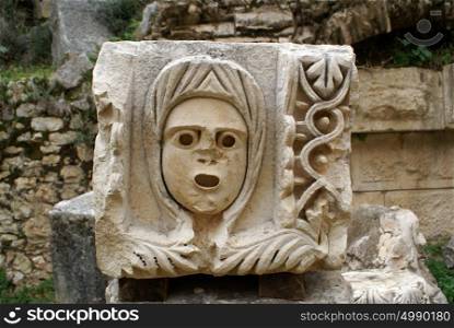 Stone mask in theater Myra, Turkey