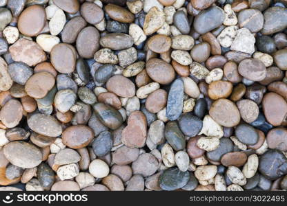 Stone pebbles texture or stone pebbles background. stone pebbles for interior exterior decoration and industrial construction concept design. stone pebbles motifs that occurs natural.