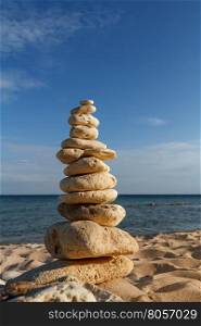 stone piles on the beach. concept of balance and harmony. rocks on the coast of the Sea in the nature