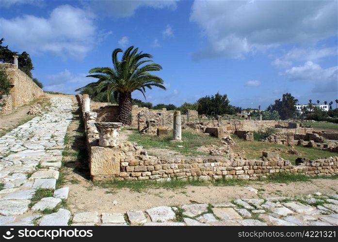 Stone road and ruins of old roman villas in Carthage, Tunisia