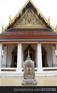 Stone sema and temple in Wat Saket Ratcha Wora Maha Wihan, Bangkok, Thailand