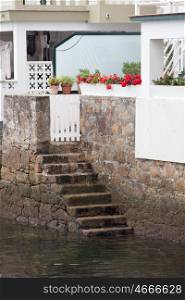 Stone stairs leading down to the sea. Redes: fishing village