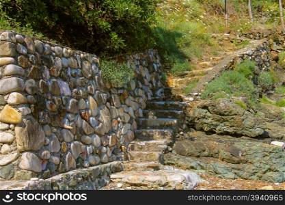 Stone stairs on the coast of the Tyrrhenian Sea, Marciana Marina on Elba Island, Italy