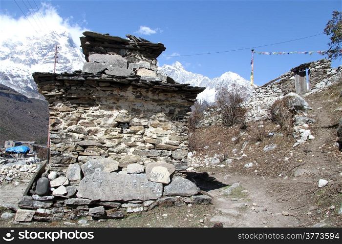 Stone stupa in the village Samagoon in Nepal