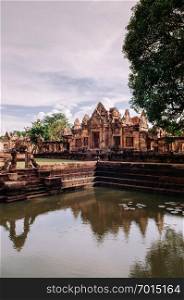 Stone temple and Barai pond of thousand years ancient Khmer architecture of Prasat Muang Tam castle in Buriram, Thailand