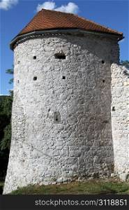 Stone tower of corner of big castle in Olguin, Croatia
