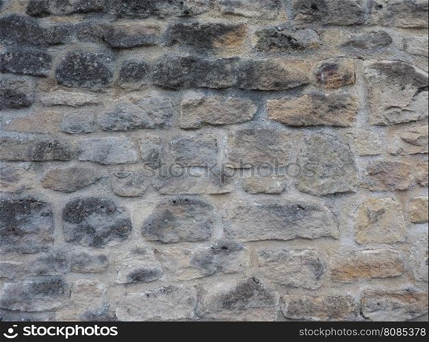 Stone wall background. Brown stone wall useful as a background
