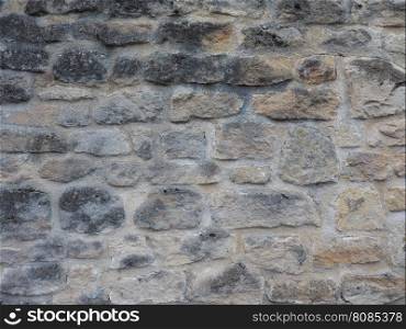 Stone wall background. Brown stone wall useful as a background