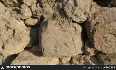 Stone wall of ancient ruins at archaeological site of Tauric Chersonese, Sevastopol, Crimea