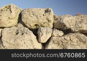 Stone wall of ancient ruins at archaeological site Tauric Chersonese, Sevastopol, Crimea