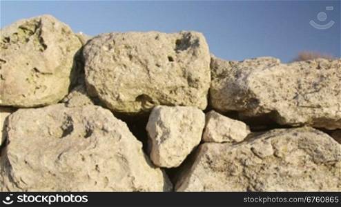 Stone wall of ancient ruins at archaeological site Tauric Chersonese, Sevastopol, Crimea