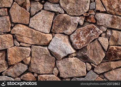 Stone wall. Outdoor background natural stone.