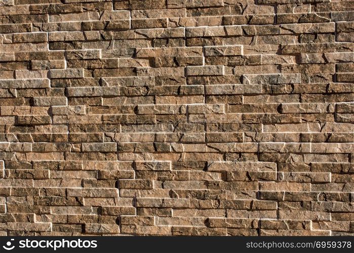 Stone wall surface as a background texture . Stone wall surface as a simple background texture pattern