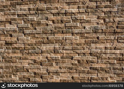 Stone wall surface as a background texture . Stone wall surface as a simple background texture pattern