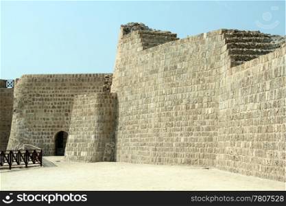 Stone walls of fort Bahrein near Manama city