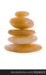 Stones of various sizes in balance on a over white background