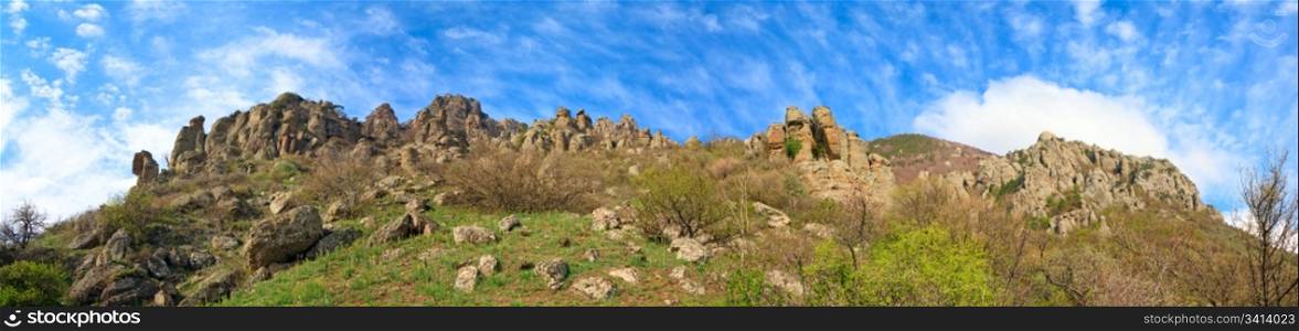 "Stony Demerdzhi Mountain panorama view (Crimea, Ukraine), and "Valley of ghosts" (with rocky bizarre geological formations) under this mount. Four shots stitch image."
