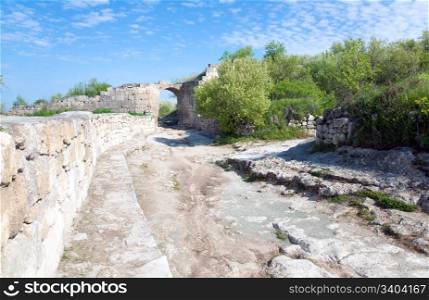 Stony road view in Chufut Kale ancient cave settlement (Crimea, Ukraine).