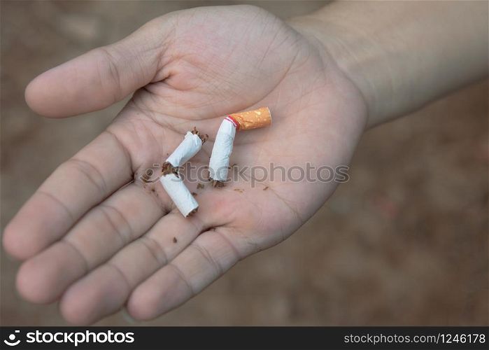 Stop cigarette, man hands breaking the cigarette with clipping path