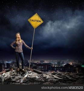 Stop pollution. Young girl in casual holding stop sign