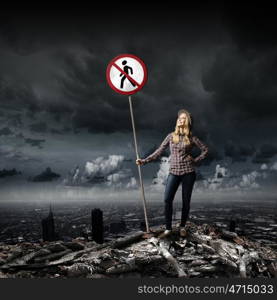 Stop pollution. Young girl in casual holding stop sign